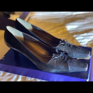 Stuart Weitzman kitten heels in brown leather.